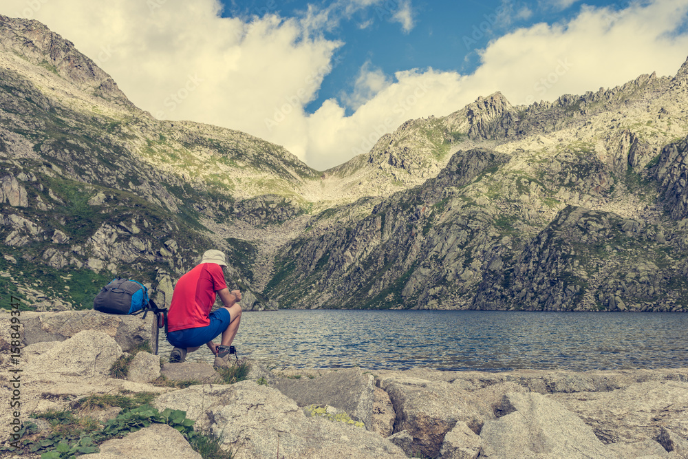 Fototapeta premium Trekker enjoying crystal clear water.