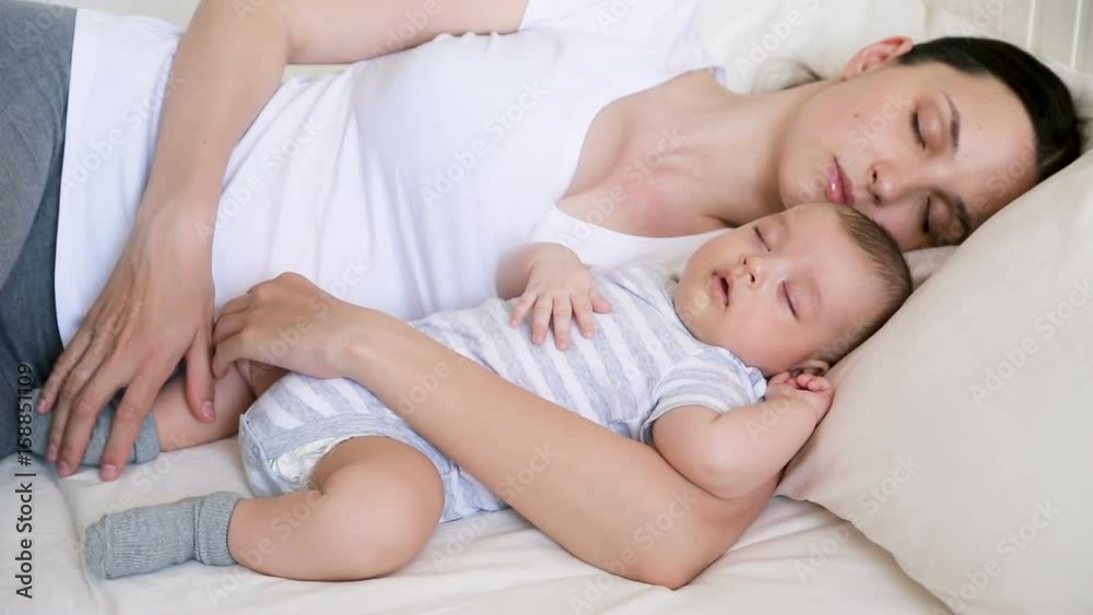 mom and son newborn sleeping in bed mom and son newborn sleeping in bed