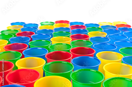 Multicolor plastic glasses isolated on white background