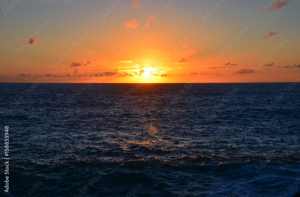 Beautiful Sunset at West Coast of Algarve between Praia do Amado and Cabo de Sao Vincente