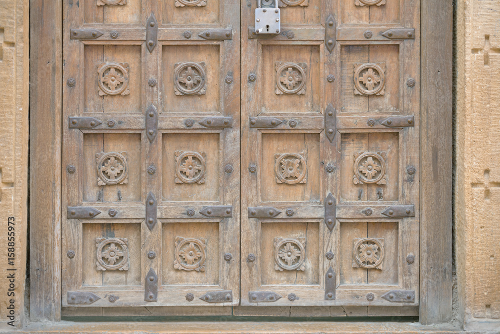 Jaisalmer, India. Heavy wooden old castle gates