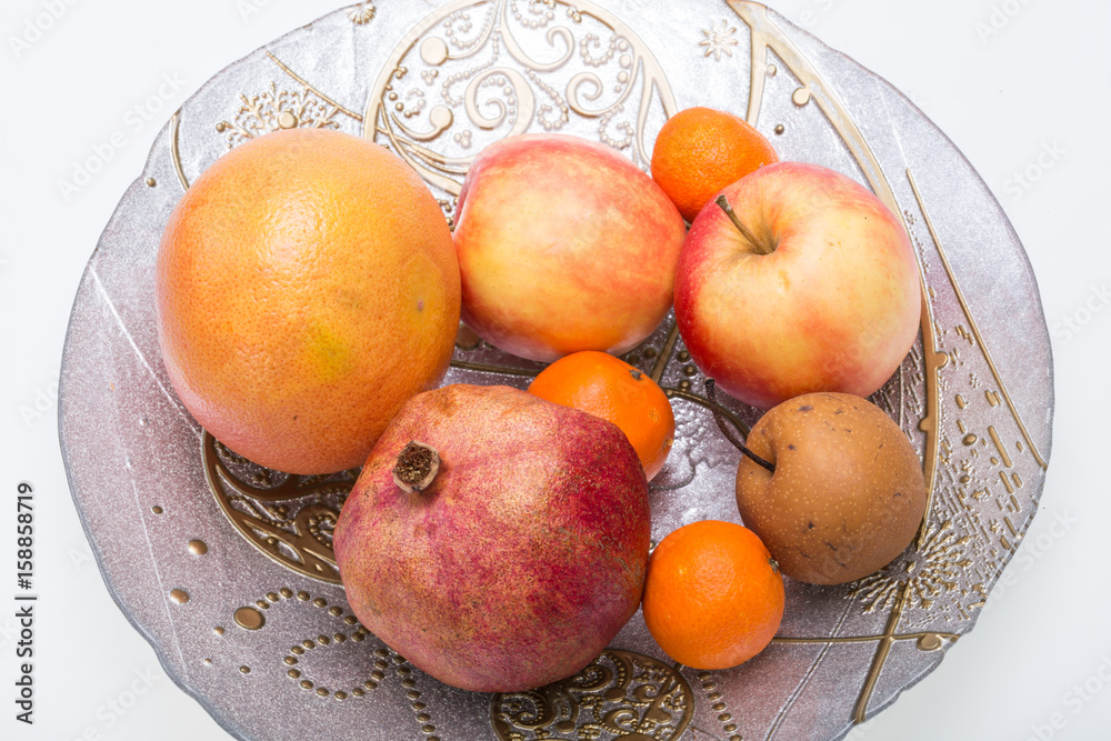 mix fresh fruits on plate isolated on white mix fresh fruits on plate isolated on white
