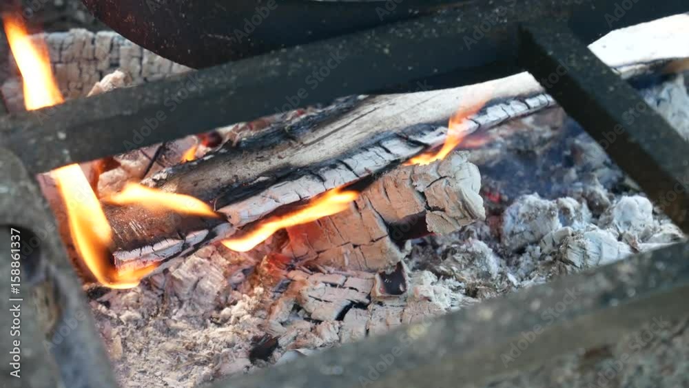 Large Cast-Iron Cauldron Pot for Cooking Food Over a Fire. Cooking in Cauldron Large Cast-Iron Cauldron Pot for Cooking Food Over a Fire. Cooking in Cauldron