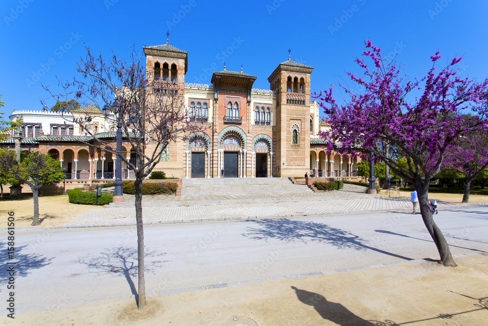 The mudejar pavilion and pond placed in the Plaza de America, houses the Museum of Arts and Traditions of Sevilla, Andalusia,