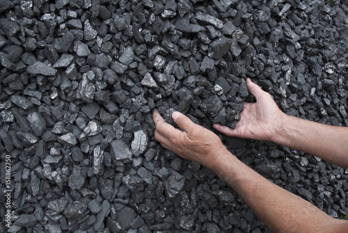 Hands of coal miner