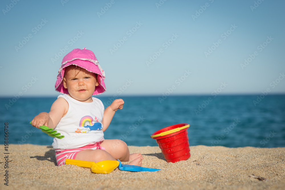 Caucasian little girl playing with bach toys Caucasian little girl playing with bach toys