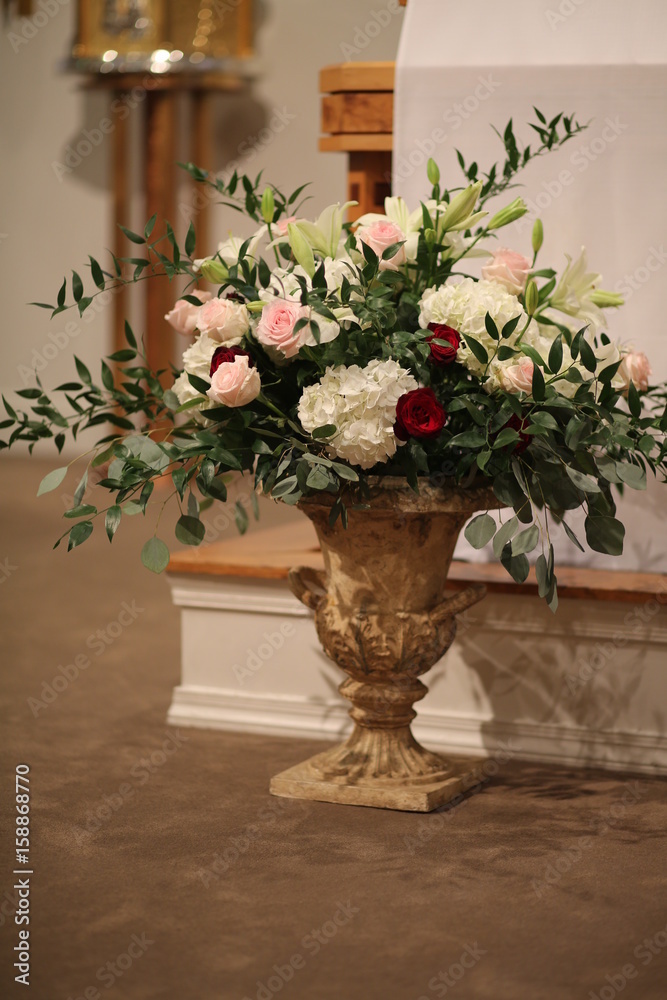 Wedding Decor Flowers: Urn of Pink, White, and Red Roses and Hydrangeas in  a Catholic Church Photos | Adobe Stock