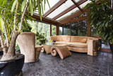 Stylish orangery with potted plants