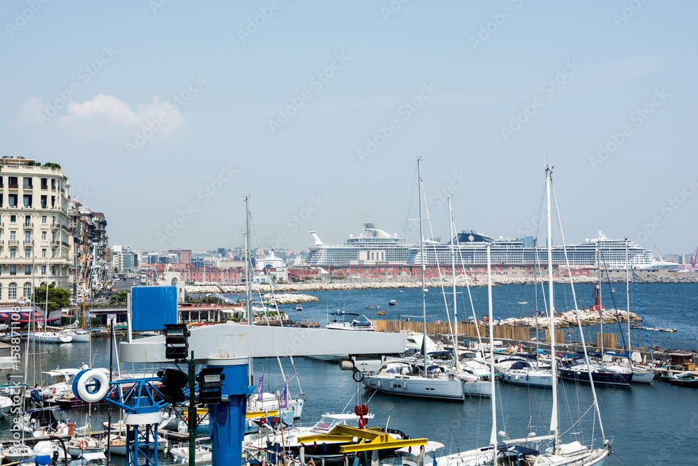 Naples marina, cruise ships visible