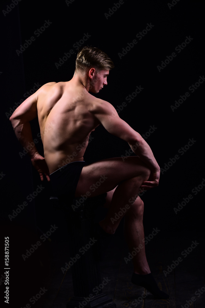 bodybuilder, muscular man with bare torso, six pack in underwear