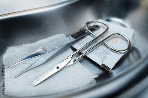 Suture removal kit in kidney dish photo