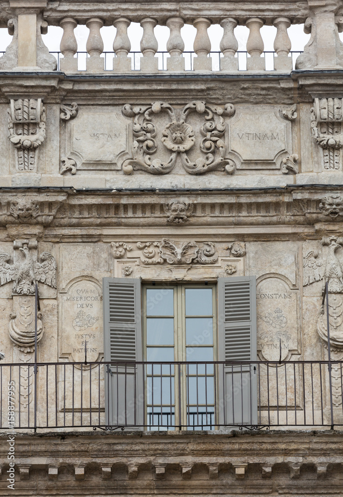 Ornamental window of Palazzo Maffei in Verona. Italy