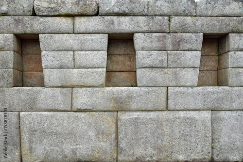 Murs à joints vifs des maisons incas du Machu Picchu au Pérou