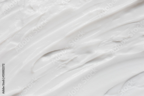 Cosmetics. Cream white background texture.