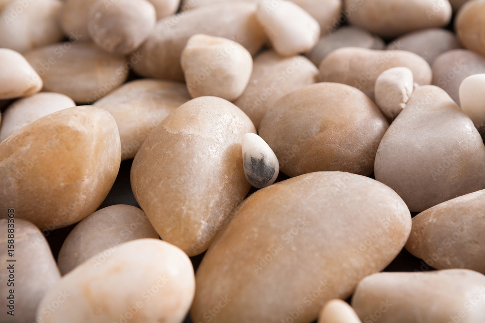 Sea pebbles background, natural seashore stones Sea pebbles background, natural seashore stones