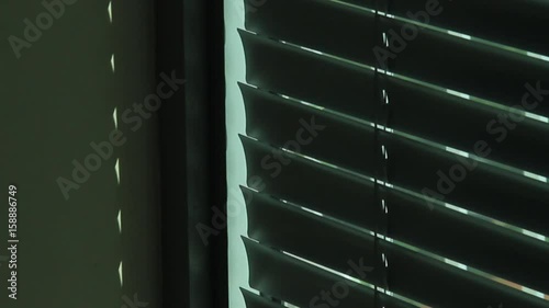Close up, shades open and close
