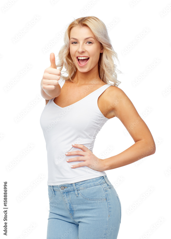happy young woman showing thumbs up happy young woman showing thumbs up