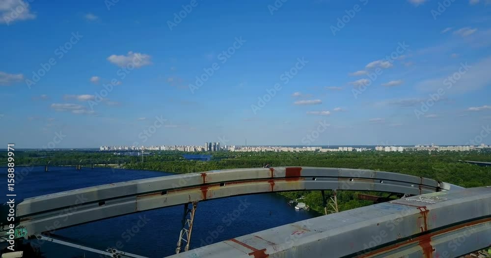 Construction of a bridge on the river. Fly over bridge Construction of a bridge on the river. Fly over bridge
