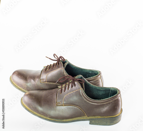 pair brown leather shoes isolated on white background , classic male shoe on white background ,close up shoes