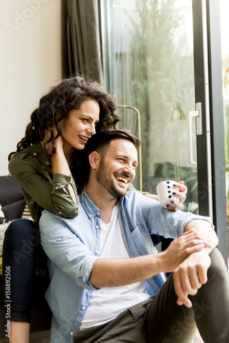 Smiling couple in casual ou...