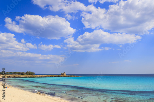Summer seascape Apulia coast  Marina di Lizzano beach  Taranto . The coastline is characterized by a alternation of sandy coves and jagged cliffs overlooking a truly clear and crystalline sea.