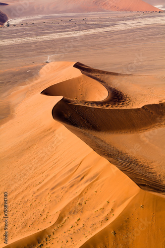 aerial view of the dunes of sossusvlei, part of the namib desert, located in namib naukluft park, namibia, africa photo