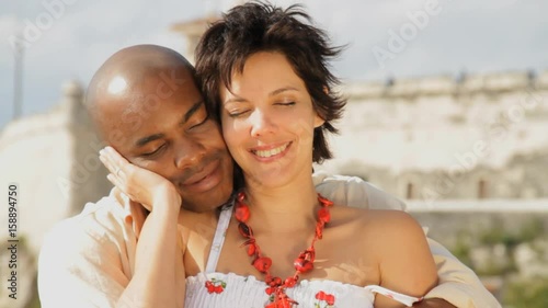 Interracial couple kiss in Cuba, close up