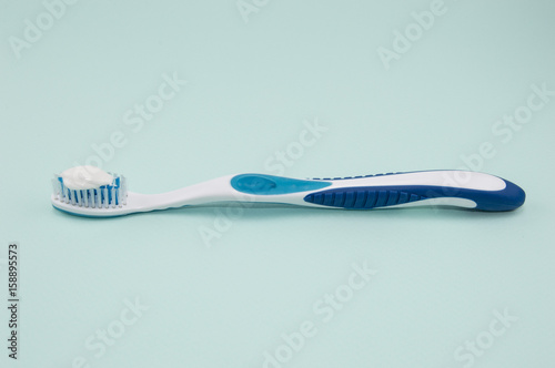 toothpaste on the toothbrush