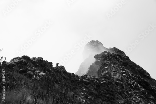 black and white shot of a misterious ridge