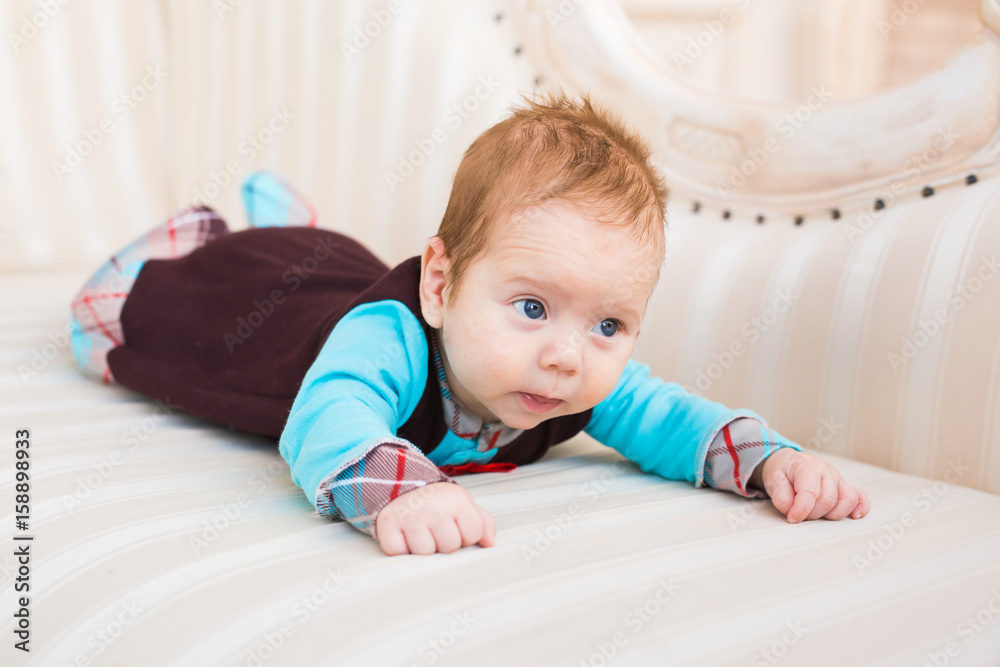 Cute baby boy, closeup portrait of adorable child, sweet toddler with blue eyes, healthy childhood, perfect caucasian infant, lovely kid, innocence concept Cute baby boy, closeup portrait of adorable child, sweet toddler with blue eyes, healthy childhood, perfect caucasian infant, lovely kid, innocence concept