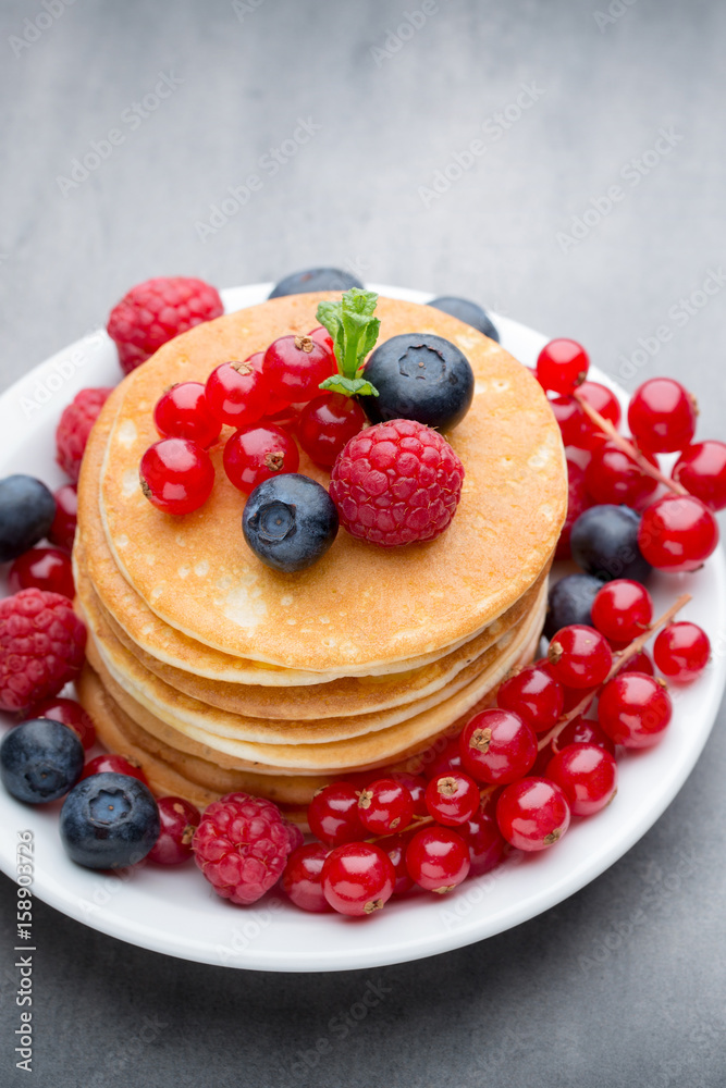 Stack of pancakes with blueberry and fresh berry. Stack of pancakes with blueberry and fresh berry.