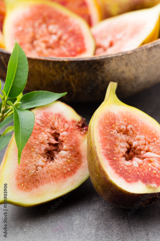 Bloody Sicilian oranges and figs. Shallow depth of field. Bloody Sicilian oranges and figs. Shallow depth of field.