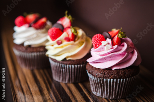 Cupcakes with strawberries and cream