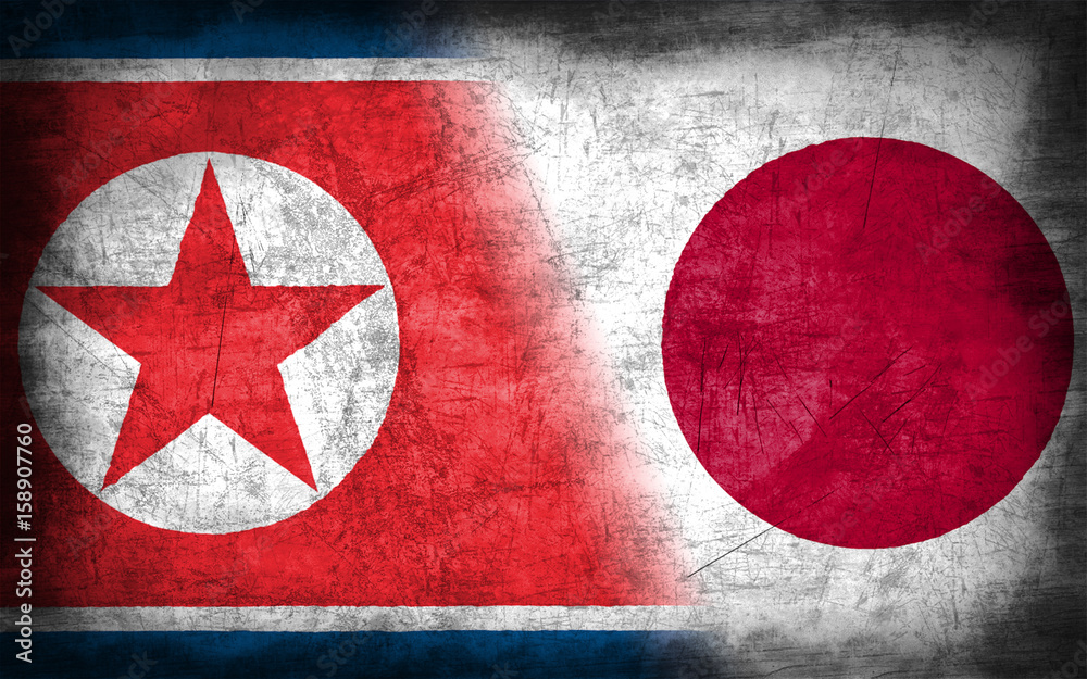 North Korea and Japan flag with grunge metal texture