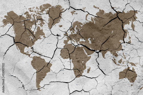 Fototapeta World map with dried soil texture