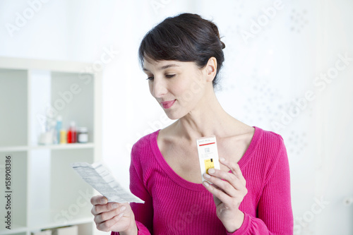 Woman taking medication
