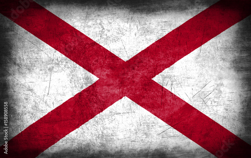 Alabama flag with grunge metal texture