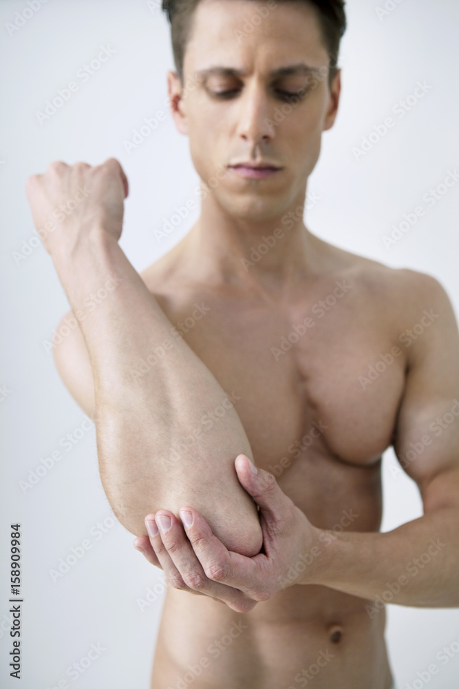 Man with painful elbow Man with painful elbow
