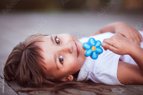 little girl with candy photo