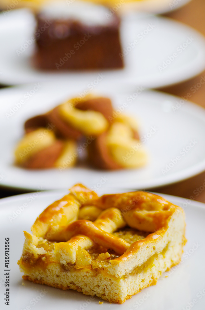 Delicious homemade pineapple cake over a white plate Delicious homemade pineapple cake over a white plate