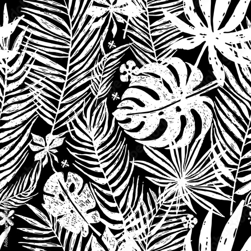 Seamless repeating pattern with white silhouettes of palm tree leaves in blac...