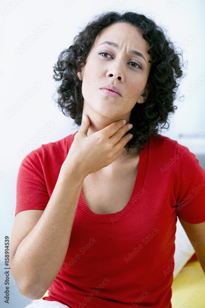 Woman with sore throat Woman with sore throat
