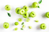 ripe green apples white table background top view