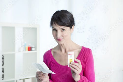 Woman taking medication