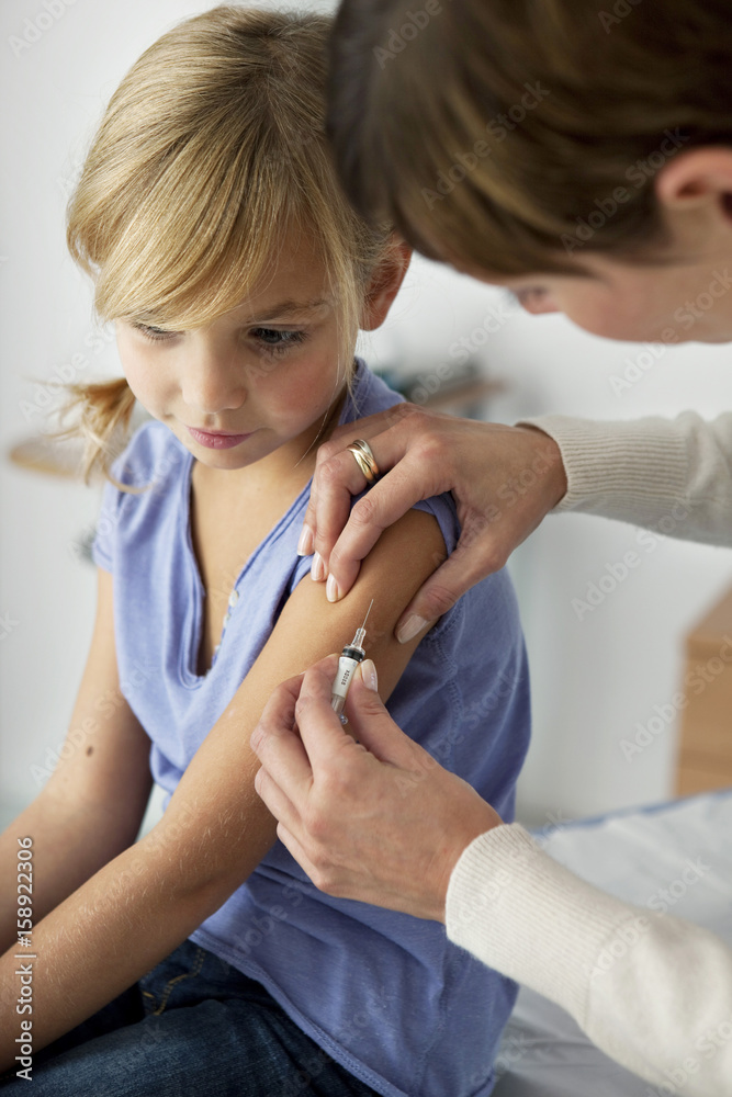 Vaccinating a child Vaccinating a child