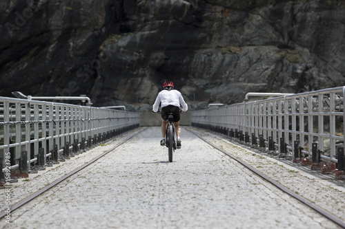 Cyclist on the dam photo