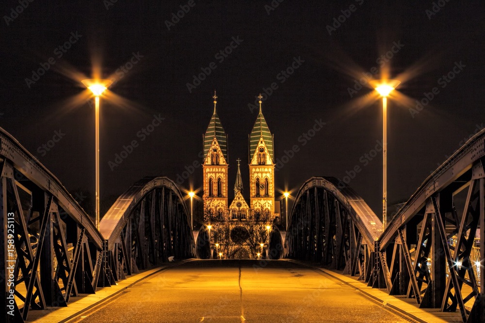 Obraz premium Freiburg which is a town near the Black Forest at night, Germany