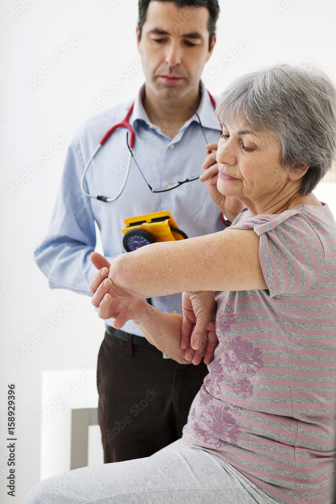 Fototapeta premium Consultation, elderly p in pain