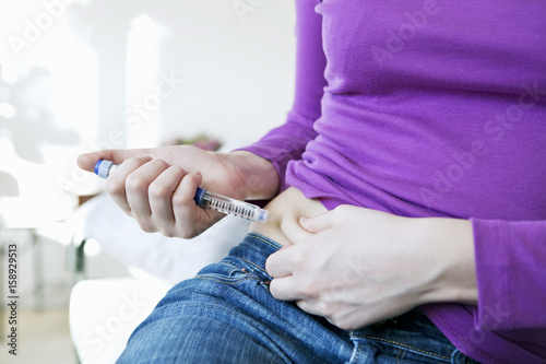 Treating diabetes in a woman photo