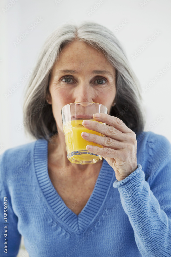 Elderly person with cold drink Elderly person with cold drink